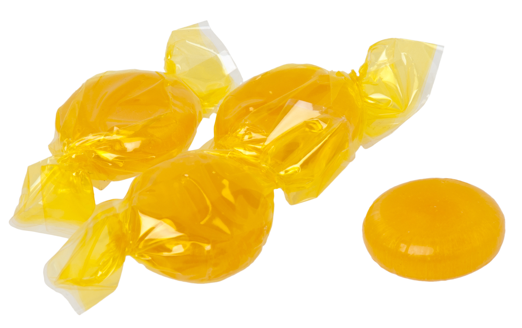 Wrapped yellow butterscotch candies and an unwrapped hard candy on a white background