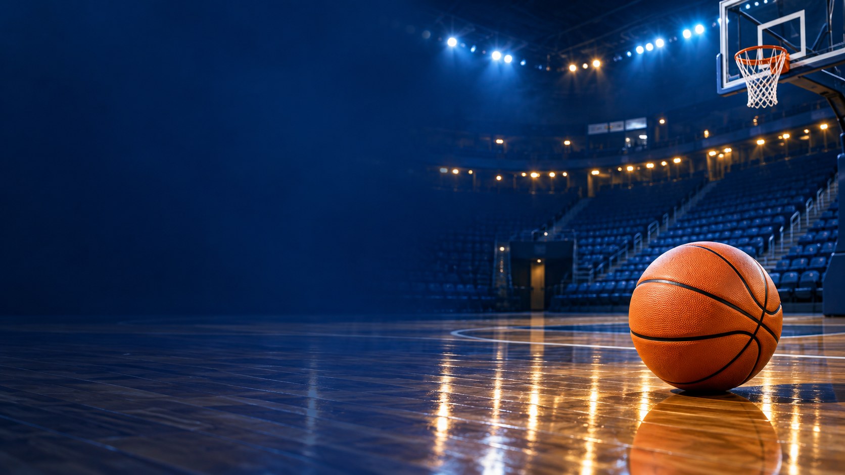 A complete basketball on an illuminated hardwood court with a hoop in the background